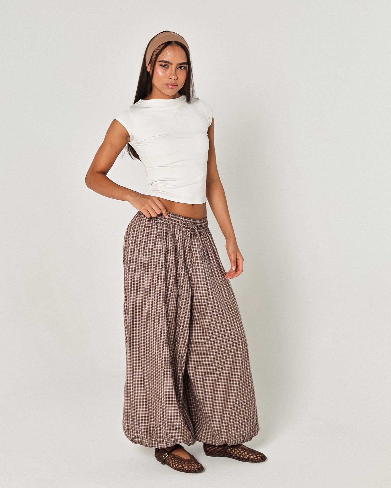 The brown plaid pants