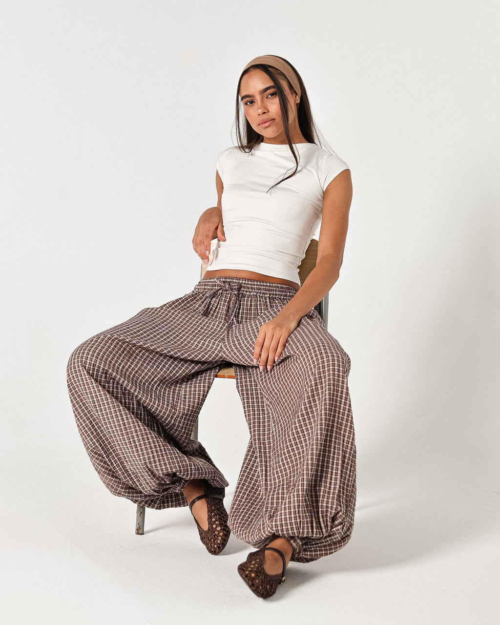 The brown plaid pants