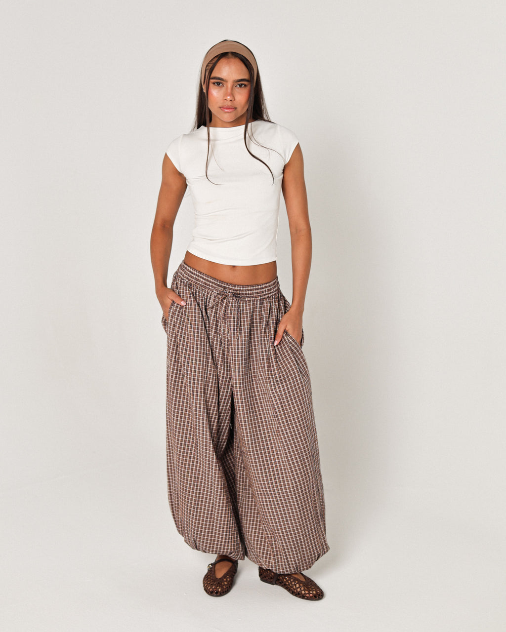The brown plaid pants
