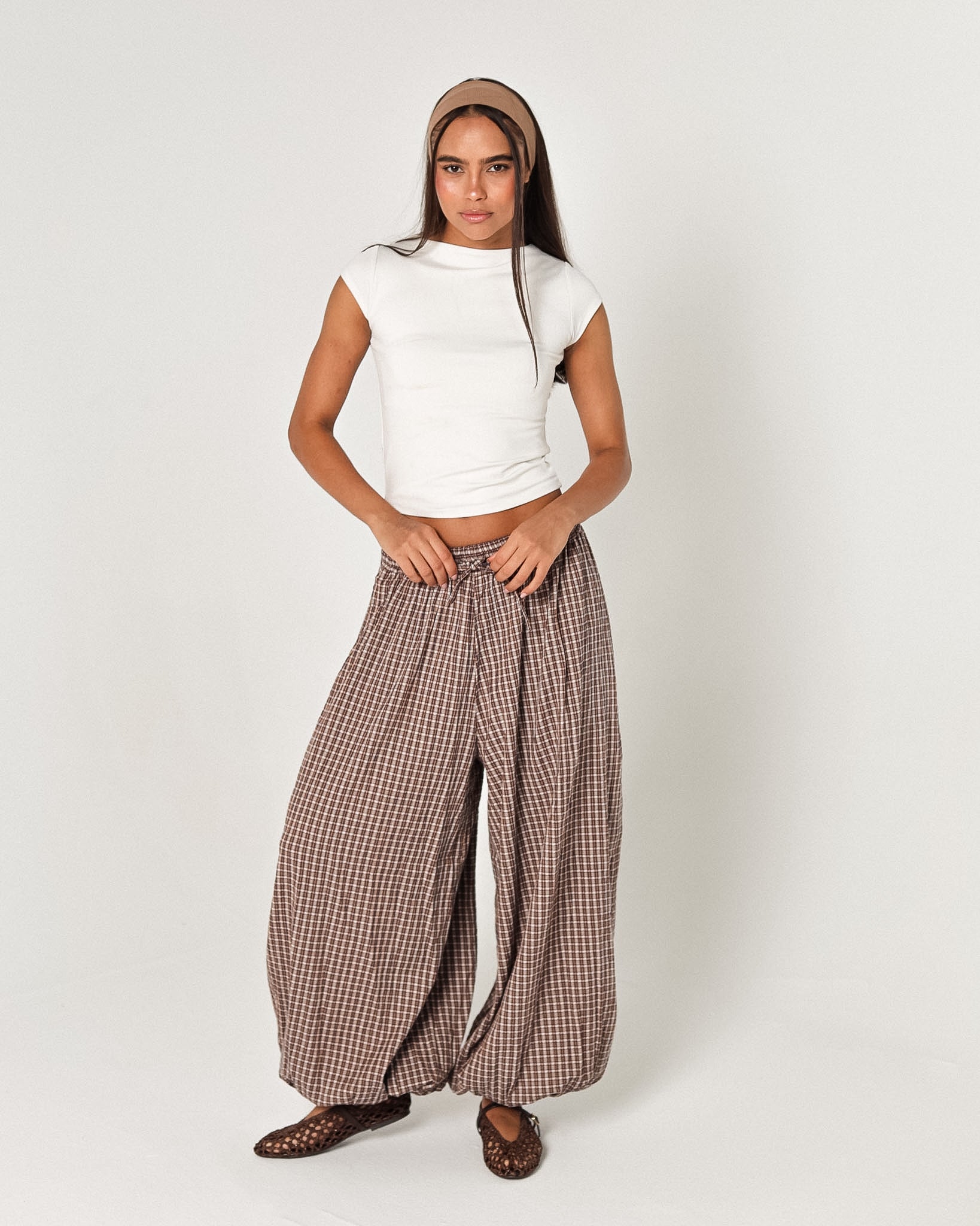 The brown plaid pants