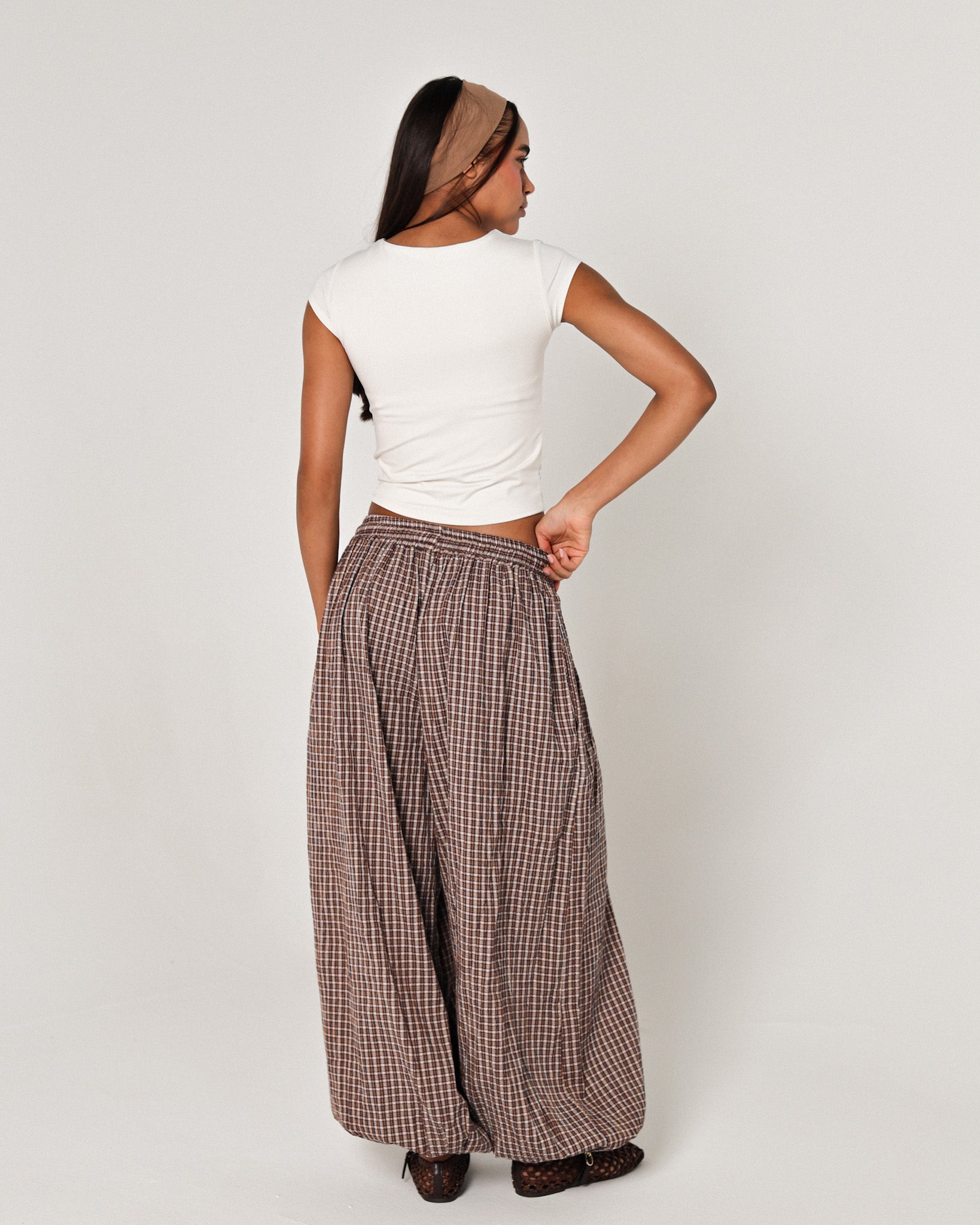 The brown plaid pants