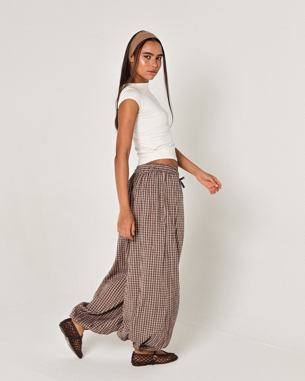 The brown plaid pants