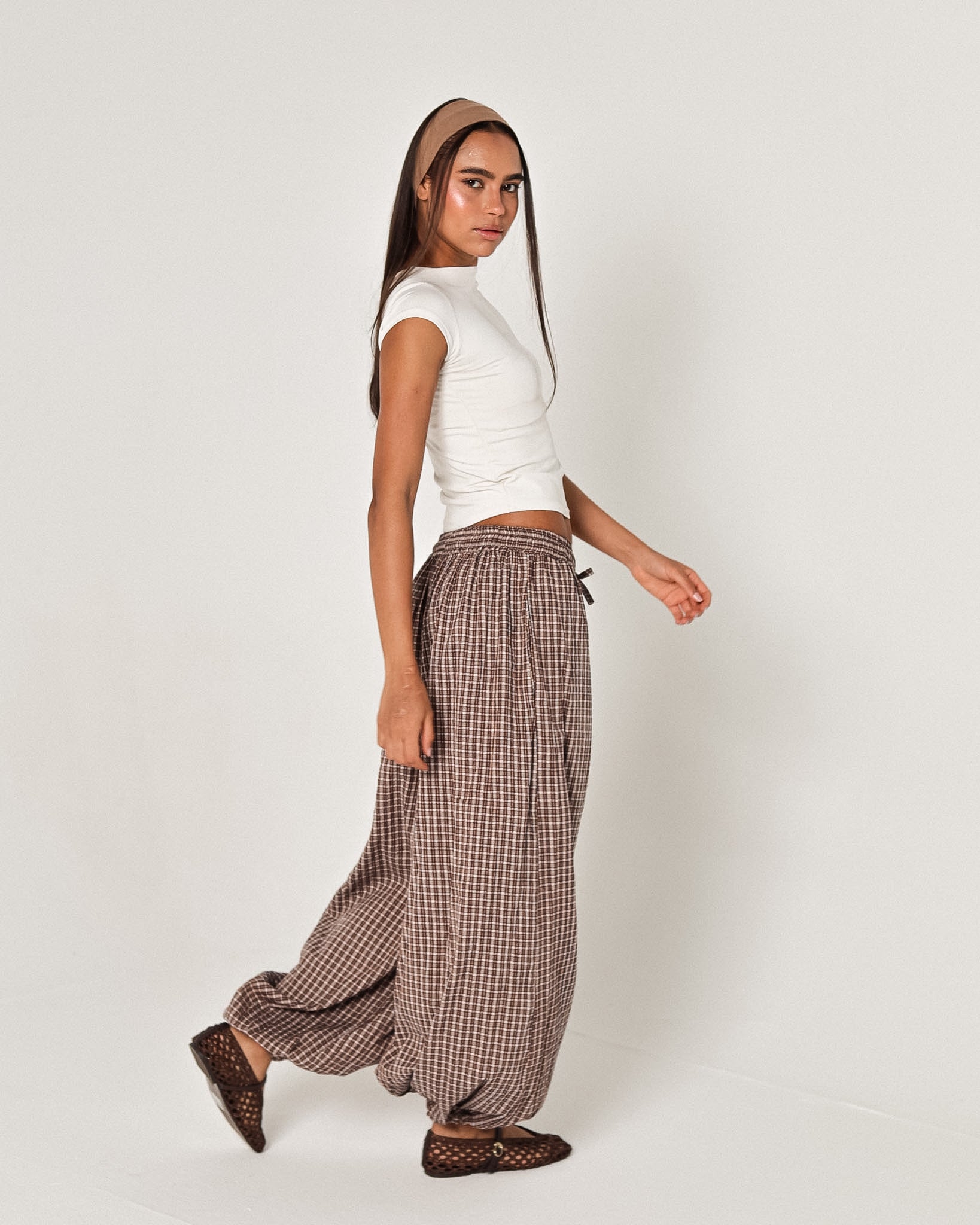 The brown plaid pants