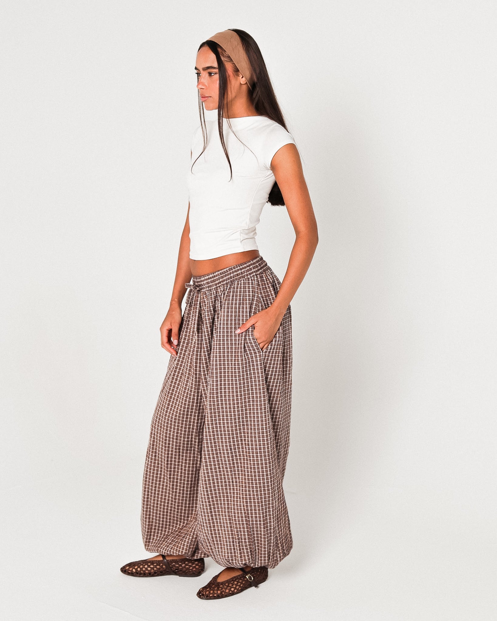 The brown plaid pants